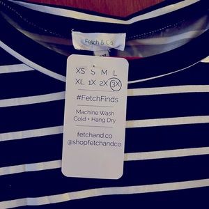 Black abs white tie around shirt